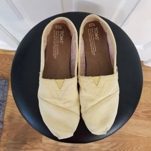 Yellow Toms shoes